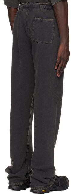 Enzyme-washed 510 gsm organic cotton fleece sweatpants. · Concealed drawstring at elasticized waistband · Three-pocket styling Supplier color: Washed black Washed Black Sweatpants With Pockets For Loungewear, Sporty Washed Black Sweatpants For Streetwear, Sporty Washed Black Sweatpants With Pockets, Urban Black Straight Sweatpants, Washed Black Relaxed Fit Cotton Sweatpants, Relaxed Fit Washed Black Cotton Sweatpants, Washed Black Cotton Relaxed Fit Sweatpants, Washed Black Sweatpants With Pockets For Streetwear, Washed Black Cotton Sweatpants For Streetwear