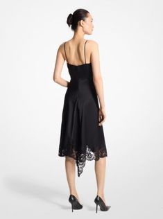 Part of our Fall/Winter 2024 Runway lineup, this asymmetric dress features a languid silhouette cut from Italian-made silk charmeuse. A silk-lined floral lace bodice evokes a lingerie feel and echoes the lace-trimmed hem. Add a slim belt and streamlined pumps for a sophisticated evening look. Evening Midi Dress With Lace Bodice, Elegant Asymmetrical Hem Party Slip Dress, Silk Slip Dress With Asymmetrical Hem For Party, Silk Cocktail Dress With Lace Trim, Satin Midi Dress With Lace Trim For Evening, Silk Midi Dress With Lace Trim For Party, Elegant Fitted Slip Dress With Asymmetrical Hem, Satin Evening Dress With Asymmetrical Skirt, Lace Midi Length Slip Dress For Evening