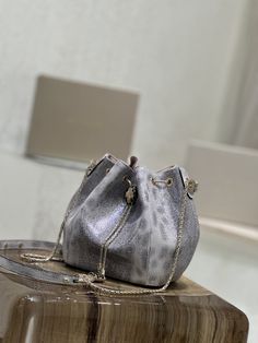 BVLGARI (Bulgari) Limited New Style - The same water snake skin bucket bag of the same style as Jolin Tsai, which is as beautiful as the skyThe silver-pink color is like stars twinkling in the sky. Super shiny. The black snake skin has a snake head and The colors of the franc are so matching, more like a work of art. Which one do you like more  

 

 Silver Snake size 16*19*11cm Luxury Silver Bucket Bag For Party, Silver Bucket Bag For Formal Occasions, Elegant Silver Bucket Bag For Evening, Luxury Bucket Bag For Party, Luxury Bucket Shape Bag For Gift, Luxury Silver Bucket Bag For Evening, Elegant Silver Bucket Bag For Party, Silver Bucket Bag For Evening, Silver Pouch Bucket Bag For Evening