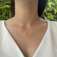 "14K Gold Moon Necklace, Tiny Crescent Moon, Minimalist Necklace, Dainty Moon Necklace This 14K Gold Moon Necklace is designed carefully to brighten your neck. It is suitable for everyday use as well as for your special days. Can be a perfect gift with its stylish and ambitious look. The crescent moon often represents growth, transition, and change. It's a symbol of potential and new beginnings. In many cultures, the moon is associated with feminine energy and is often linked to goddesses or dei Minimalist Yellow Gold Moon Necklace, Minimalist 14k Gold Half Moon Necklace, Feminine Intuition, Dainty Moon Necklace, Moon Minimalist, Tiny Gold Necklace, Simple Gold Necklace, Gold Star Pendant, Gold Minimalist Jewelry