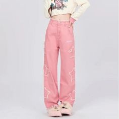 Step out in style with our Women's Pink Vintage High-Waisted Wide Leg Jeans, a perfect blend of classic charm and modern streetwear vibes. Designed for fashion-forward individuals, these jeans feature a vibrant pink hue that makes a bold statement on any occasion. Crafted with high-quality cotton and polyester, these jeans ensure comfort without compromising on style. Ideal for spring and summer, they bring a fresh, funky edge to your wardrobe. Features Material blend of cotton and polyester for durability and comfort. Non-stretch cotton denim ensures a flattering fit that holds its shape. High-waisted design accentuates your silhouette. Functional pockets and decorative elements such as fake zippers and vintage buttons enhance style and practicality. Light wash finish for a relaxed, worn- Pink Wide Leg Cotton Jeans, Cheap Pink Streetwear Jeans, Streetwear Pink Denim Pants, Pink Wide-leg Jeans With Side Pockets, High-waist Pink Jeans With Five Pockets, High Waisted Wide Leg Jeans, Modern Streetwear, High Street Fashion, Jean Large