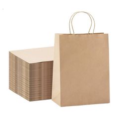 brown paper bags are stacked on top of each other, with one bag in the middle