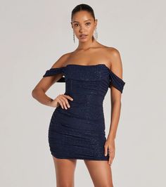 Get ready to glimmer in this gorgeous glitter knit mini dress featuring an off-the-shoulder neckline with a draped overlay and short sleeve cuffs, and a chic corset bodice for that snatched fit you love. The ruched side seams will accentuate your curves along the bodycon silhouette.   Fit & Features    Lined glitter knit fabric, plenty of stretch  Off-the-shoulder angled neckline  Draped overlay, short sleeve cuffs  Corset bodice, flexible boning  Ruched side seams  Mini-length bodycon fit  Runs true to size Black Mini Prom Dress, Navy Blue Dresses Short, Off-shoulder Mini Dress With Fitted Bodice For Prom, Off-shoulder Mini Dress With Fitted Bodice, Stretch Off-shoulder Evening Mini Dress, Off The Shoulder Dress Short, Elegant Off-shoulder Mini Dress With Sequins, Satin Off Shoulder Dress, Glamorous Off-shoulder Mini Dress With Fitted Bodice