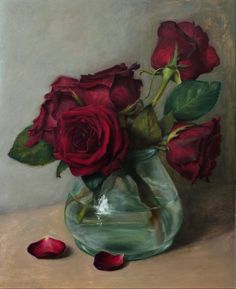 a painting of red roses in a glass vase with two petals on the ground next to it