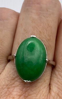 "Delicate and detailed Jade and stone and 925 sterling silver ring.  Oxidized with age, we can re polish it for you.  This is about 3/4 inch long   Size 7 or 8 My jeweler can re size this for $20 fee.  Ships free in the US in a gift box.  Check out our over a THOUSAND great reviews This is \"fun jade\" Color enhanced stone. Vintage 1970's re finished." Untreated Silver Emerald Ring In Oval Shape, Untreated Oval Emerald Ring In Silver, Collectible Oval Emerald Ring In Sterling Silver, Classic Oval Emerald Ring Stamped 925, Classic Silver Jade Ring, Classic Silver Ring With Jade, Silver Jade Rings For Formal Occasions, Formal Silver Jade Ring, Biker Rings Mens