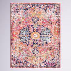 an orange, pink and blue area rug