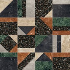 an abstract pattern made up of different colors and shapes, including black, white, green, orange and grey