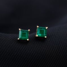 Product Details Make your loved ones day with our stunning Solitaire Stud Earring featuring a 5mm Princess Cut Emerald. Crafted with elegance and shine in mind. Product Information SKU SHP-EARRINGS062190059 Length 4.6 mm Width 4.6 mm Weight 0.96 gm EMERALD INFORMATION No.of Stones 2 Pieces Total Weight 0.72 Carat Dimension(approx) Princess Cut-4X4 mm-2 Pcs Color Green Cut Brilliant cut Shape Princess Cut Setting Type 4-Prong-Setting Quality Grade AAA View More Emerald Green Earrings, Emerald Earrings Studs, Solitaire Earrings, Solitaire Studs, Signature Jewelry, Emerald Earrings, Emerald Jewelry, Timeless Jewelry, Type 4