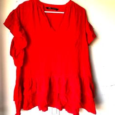 Zara Xs Blouse Red V Neck Ruffle Hem Nwot Flowy Runs Big Red Casual Tops With Ruffle Hem, Casual Red Tops With Ruffle Hem, V-neck Rayon Top With Ruffles, Red Ruffle Sleeve Blouse For Summer, Red Ruffle Sleeve Top For Summer, Red Ruffle Sleeve Summer Tops, Chic Red Top With Ruffle Hem, Flowy Red Short Sleeve Tops, Red Flowy Short Sleeve Blouse