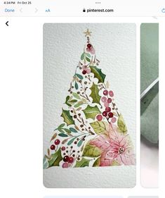 an image of a christmas tree made out of watercolor paper and crayons