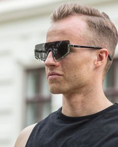 These noticeable sunglasses are an interpretation of the sporty shield shape, destined to enrich the urban buzz of the city life. The frame of the glasses is made of contrasting materials and clings only to the lower part of the lenses, while leaving the eyebrow area free. It's accompanied by fine, low-set temples. The stylish accessory is made of polycarbonate, zinc alloy and copper. The sunglasses are being delivered together with a protective pouch with Urban Classics logo and drawstring clos Trendy Aviator Sunglasses With Uva Protection For Streetwear, Wayfarer Sunglasses With Uv Protection For Streetwear, Trendy Aviator Sunglasses With Uv Protection For Streetwear, Futuristic Shield Sunglasses With Mirrored Lenses For Summer, Futuristic Anti-reflective Shield Sunglasses For Summer, Futuristic Mirrored Shield Sunglasses For Summer, Cool Polarized Sunglasses For Streetwear, Sporty Sunglasses With Mirrored Lenses For Streetwear, Sporty Mirrored Sunglasses For Streetwear