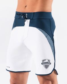 HIGHLIGHTS.. Unlined boardshort. 9” inseam Reflective branding at leg opening and back waistband Elastic waistband with adjustable self-tie drawcords Color-blocking panelling Water resistant fabric FIT SUGGESTION. This item runs true to Alphalete’s standard sizing.. Fit is based off of waist size in inches.. If you are between sizes, we recommend sizing up for a relaxed fit.. Eric is 6’2”/188cm, wearing a size 32. MATERIALS AND WASHING DIRECTIONS. 67% Nylon, 23% spandex. Due to the high saturati White Short Swimwear For Surfing, White Training Bottoms With Elastic Side Panels, White Sporty Swim Trunks For Water Sports, White Short Swim Trunks For Water Sports, White Activewear With Elastic Side Panels For Gym, White Activewear For Gym With Elastic Side Panels, White Surfing Swim Trunks, White Surfing Shorts, Fitted White Swim Trunks For Surfing