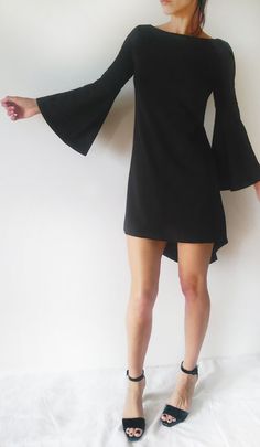 Wide Sleeves Black Cotton Jersey Minimalist by CodeDesignItems Black A-line Asymmetrical Dress For Formal Occasions, Chic Black Stretch Asymmetrical Dress, Sleek Black Asymmetrical Dress, Fall Party A-line Asymmetrical Dress, Elegant Solid Color High-low Hem Dress, Black Stretch Asymmetrical Dress For Date Night, Elegant Black Mini Asymmetrical Dress, Elegant Black Asymmetrical High-low Dress, Modern Black Asymmetrical Evening Dress