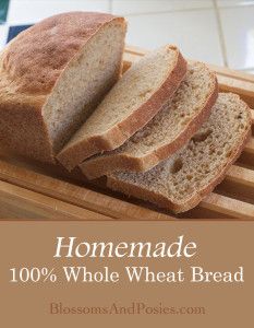 homemade 100 % whole wheat bread on a cutting board with text overlay reading homemade 100 % whole wheat bread