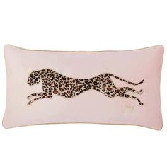 a pillow with a cheetah design on the front and side of it, in pink