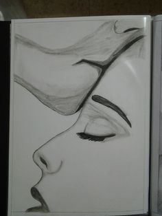 a drawing of a woman's face with her eyes closed