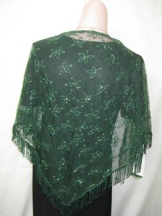 This beautiful green collar has green bead on net fabric and same color tassels . This can be paired with a blouse, dress, or jacket. It is pictured with a black top (not included) but can be paired with just about any color. = Elegant Green Embroidered Shawl, Fitted Shawl For Summer Party, Fitted Vintage Shawl, Fitted Shawl For Party And Festive Occasions, Elegant Green Shawl For Spring, Elegant Green Shawl For Party, Elegant Festive Green Shawl, Elegant Green Shawl For Fall, Elegant Green Fall Shawl