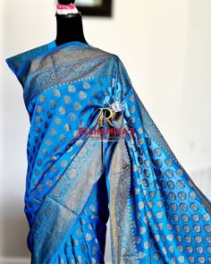 We insist to read through the details provided and message us for any questions and doubts before buying. We try to provide the best services and quality as much as possible. Asking before will help fulfill our customer's need and expectation. Also this will refrain us gaining negative feedbacks as we are a very small home based business. Beautiful Conalt color semi Banaras georgette saree with fall edging done. The saree has beautiful mat finished zari work all over.  Please note: We try our best to capture the pic exactly or close to the actual color. Sometimes the camera/lighting matters and screen of individuals as well. We would expect a little to approx. A little color variations for all SAREES.  We don't do alterations or any kind of tailoring service. Happy Shopping :) Thanks for y