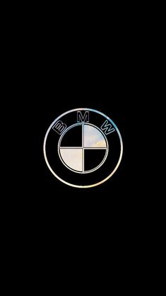 the bmw logo is shown on a black background in this image, it appears to be an emblem