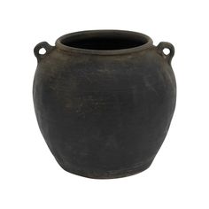 an old black vase is shown on a white background with clippings to the side