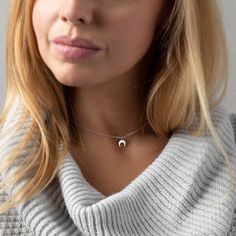 "Dainty upside down moon necklace. Perfectly balanced and totally cute. The ideal, minimal piece for everyday.  D E T A I L S: * Top quality moon charm - 3/8\" (9.5mm)  * Beautiful dainty chain * Photo shows a length of 14\" (XS neck)  M A T E R I A L S: * All sourced from USA or Italy * 100% sterling silver chain and moon charm * Comes in a cute little package ready for gifting HANDMADE WITH LOVE * All items are handmade with love in our happy Louisiana studio. * We use only highest quality, ethically sourced materials. * Committed to providing you with excellent customer service. SHIPPING UPGRADES We offer shipping upgrades should you need your order faster. They will be displayed as an option once you add an item in your cart. GIFTS & PACKAGING We want to be good to the planet, so we sh Minimalist Crescent Charm Necklace With Clavicle Chain, Silver Minimalist Charm Necklace For Layering, Minimalist Crescent Clavicle Chain Charm Necklace, Minimalist Crescent Necklaces For Everyday, Minimalist Half Moon Clavicle Chain Necklace, Minimalist Crescent Moon Phase Charm Necklace, Everyday Minimalist Crescent Necklaces, Minimalist Half Moon Phase Necklace, Minimalist Moon Shape Charm Necklace With Clavicle Chain