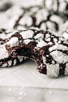 chocolate crinkle cookies with powdered sugar on top