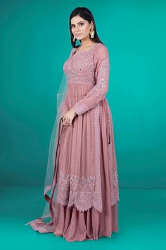 Introducing our elegant Partywear Suit D-116! Featuring a comfortable plazzo and exquisite mirror and thread work, this suit is the perfect choice for any special occasion. Enjoy the blend of traditional and modern designs in this expertly crafted piece. Elevate your style with our Partywear Suit D-116. Diwali Floor-length Palazzo Set With Mirror Work, Pink Palazzo Set With Dori Work For Wedding, Floor-length Salwar Kameez With Dori Work For Eid, Floor-length Palazzo Set With Dabka Work For Diwali, Georgette Palazzo Set With Dori Work For Eid, Festive Floor-length Palazzo Set With Dori Work, Elegant Chikankari Embroidery Anarkali Set, Maxi Length, Anarkali Floor-length Palazzo Set With Dori Work, Anarkali Palazzo Set With Dabka Work, Maxi Length