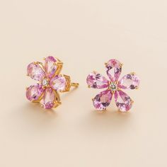 Florea earrings in 18K gold vermeil set with Pink sapphires and Diamonds. Pink sapphire: ~5. 0 carats (10 of 6mm x 4mm pear) Diamond VS+ grade: ~0. 1 carats (2 of 2mm VS round) Each earring dimension: 13. 1mm height x 13. 4mm width x 3mm depth. Options available in 9K, 14K and 18K gold and additional sizes available, please contact Juvetti. Flower of happiness blooms from within. Our precious jewellery is designed to preserve its original brilliance over time. There are a few precautions to make Elegant Pink Sapphire Earrings For Anniversary, Elegant Rose Gold Earrings With Pink Sapphire, Elegant Rose Gold Pink Sapphire Earrings, Gold Pink Sapphire Earrings Fine Jewelry, Gold Pink Sapphire Earrings In Fine Jewelry Style, Luxury Pink Sapphire Earrings As Gift, Elegant Pink Sapphire Earrings With Prong Setting, Luxury Pink Sapphire Earrings For Gift, Rose Gold Pink Sapphire Earrings As Gift