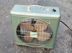 an old air conditioner sitting on the ground