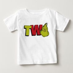 a white t - shirt with the word wt written in red and green letters