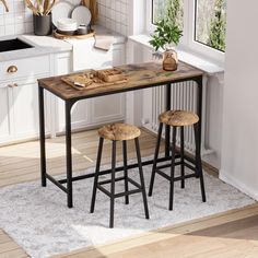 two stools and a table in a kitchen