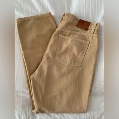 B Sides Jeans Mid Waist Long Rise Straight Leg Denim Jeans In A Beige Tan Desert Sand Color, In Size 30 In Very Good Previously Worn Condition. 100% Cotton. Made In Usa. Quality Fabric, Soft But Substantial. Leather B Sides Jeans Patch On Back Waist. Signature Brass Button Closure. Zip Fly. Can Be Worn Lower On The Waist For A Slouchy Baggy Look. Condition: Very Good Previously Worn Condition. Some Fading And Light Signs Of Wear. But Overall In Great Condition. Approx Measurements: Size 30 Waist Beige Jeans With Patch Pockets For Work, Beige Workwear Jeans With Five Pockets, High Waist Beige Jeans With Belt Loops, Mid-rise Khaki Jeans With Patch Pockets, High Rise Khaki Jeans For Work, Beige Relaxed Fit Jeans With Patch Pockets, Khaki Straight Leg Jeans With Patch Pockets, Relaxed Fit Khaki Jeans With Belt Loops, Beige Five Pocket Denim Pants