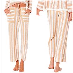 Rip Curl Namotu Stripe Drawstring Pants Knit Size Small In Cream Color Pockets Features: Beachy Stripes, Drawstring Pants, Perfect For Sunset Cocktails And Other Post-Surf Activities, Lounge, Casual, 80% Polyester, 20% Acrylic, Cozy Knit Stripes, Wide Leg Approximate Measurements Laying Flat 25 1/2" Inseam 21" Leg Opening 13" Front Rise 17" Back Rise Striped Long Pants For Beach, Stretch Tie-side Bottoms For Loungewear, Striped Tie-side Bottoms For Vacation, Casual Striped Lounging Bottoms, Casual Striped Bottoms For Lounging, Long Pants For Lounging During Beach Season, Striped Bottoms For Summer Lounging, Summer Striped Lounging Bottoms, Striped Lounging Bottoms For Summer