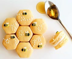 some cookies are arranged in the shape of honeybees