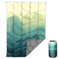 an image of a blue and green sleeping bag next to it's side view