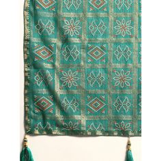 Turquoise Green colored saree is made from zomato fabric which is highlighted with beautiful bandhani foil print work and tassels border as shown. comes along unstitched raw silk blouse piece which you can customise as per your design/style. Occasion - You can wear this saree for festivals, parties and ideal for any fashionista. Note:- The actual product may differ slightly in color and design from the one illustrated in the images when compared with computer or mobile screen. Measurements: Saree : Chiffon : 5.5 Mtrs Blouse : Chiffon : 0.8 Mtr Material: Chiffon Stitch Type: Unstitched Country of Origin: India Care Guide: Dry Clean Multicolor Semi-stitched Dupatta With Latkans, Festive Chanderi Traditional Wear With Tassels, Festive Traditional Chanderi Wear With Tassels, Traditional Tasseled Sharara For Eid, Bohemian Sharara With Tassels And Traditional Drape, Bohemian Sharara With Tassels In Traditional Drape, Bohemian Tassel Sharara For Navratri, Festive Green Bohemian Sharara, Navratri Chanderi Dupatta With Tassels