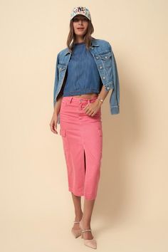 Expertly crafted from durable cargo denim, this midi skirt in a soft pink hue offers a versatile and stylish addition to any wardrobe. Its cargo design adds both functionality and a touch of edginess to this classic piece. Perfect for a casual yet chic look. - 100% Cotton- Non-Stretch Denim- Color Cargo Slim Boot- Front Zipper Fly- 7 pocketsModel is wearing size S . Height 5'8Waist 28"Hip 36"Front Rise 30"Sweep 35" Style: Casual Print / Pattern: Pink Dye Denim Silhouette: Cargo Fit: Midi Embelli Spring Pink Bottoms With Cargo Pockets, Fitted Denim Skirt With Cargo Pockets For Spring, Pink Utility Bottoms For Summer, Pink Cargo Style Bottoms For Spring, Spring Fitted Cargo Style Skirt, Trendy Spring Denim Skirt With Multiple Pockets, Fitted Cargo Style Skirt For Spring, Trendy Cotton Skirt With Multiple Pockets, Trendy Spring Denim Skirt With Cargo Pockets