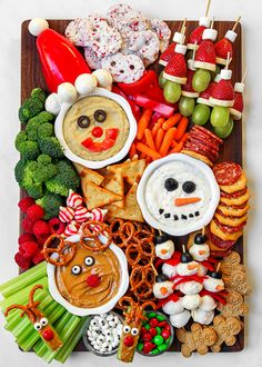 an assortment of food is displayed on a board