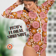 "1970s vintage Flower Power print long-sleeve surf women's swimsuit. Our charming rash guard one-piece swimsuit features a high neckline with front zip, fully lined and a cheeky bottom for a \"far out\" surfing babe look.  1970s Floral Print Flattering vintage style Easy-up plastic front zipper Fully lined front and back with a covered back  Medium leg and cheeky bottom Protection Swimwear UPF 50+ Imported - ships from abroad FIT Fits true to size.   To order the best size for you, use the chart Spring Long Sleeve Surfing Bodysuit, Long Sleeve Floral Print Swimwear For Surfing, Long Sleeve Floral Print Swimwear For Beach Season, Retro Fitted Printed Swimwear, Floral Print Swimwear For Surfing In Spring, Retro Fitted Floral Print Swimwear, Retro Bodysuit For Swimming And Beach Season, Retro Printed Swimwear For Beach Season, Retro One-piece Bodysuit For Beach Season