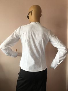 "This white cotton shirt has the perfect body fit.The square neck ,embroidered front and gentle ruffles makes it feminine and playful.Can wear it with skirt or jeans for every day or add a little scarf to finish the look for the office. SIZE CHART SIZE S - US 6, UK 8, EU 36 bust: bust around 34.5\"/90cm Waist: waist around 27.5\"/70cm Hips: hips around 34.5\"/90cm SIZE M - US 8, UK 10, EU 38 bust: bust around 37.5\"/95cm Waist: waist around 29.5\"/75cm Hips: hips around 37.5\"/95cm SIZE L - US 1 Womens White Blouse, White Blouse Long Sleeve, Square Neck Shirt, Women White Blouse, White Long Sleeve Blouse, Blouse Long Sleeve, Blouse Casual, Cotton Blouse, Long Blouse