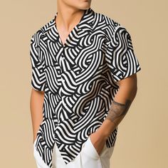 Elevate your vacation wardrobe with this Geometric Art Deco Shirt for Men, a stylish button-up featuring an abstract design perfect for travel lovers. This modern vacation wear casual button-down shirt is also available in plus sizes, making it an ideal gift for any fashion-forward traveler. 𝐃𝐄𝐓𝐀𝐈𝐋𝐒 🌀95% Polyester | 5% Spandex 🌀Boxy fit, straight cut 🌀Runs large, check your measurements against size chart 🌀Includes Chest Pocket 🌀Colors may appear different on different screens 𝗖𝗔𝗥 Black Shirt With Geometric Pattern For Spring, Modern Graphic Print Shirt For Summer, Modern Graphic Print Summer Shirt, Black Casual Shirt With Geometric Pattern, Casual Black Shirt With Geometric Pattern, Casual Geometric Pattern Tops For Vacation, Modern Summer Tops With Abstract Print, Modern Printed Tops For Summer, White Shirt With Geometric Pattern For Summer