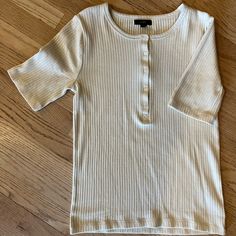 Cute Henley In J Crew Classic Ivory. Dress It Up Or Down, Can Be Styled So Many Ways. Bought To Give As Gift Then Forgot About It! Never Worn! Elegant Cream Ribbed Tops, Ribbed Beige Tops For Workwear, Beige Ribbed Tops For Workwear, Ribbed Beige Workwear Tops, Beige Ribbed Tops For Work, Neutral Ribbed Tops For Spring, Classic Neutral Tops For Day Out, Cream Ribbed Top For Spring, Beige Ribbed Top For Day Out