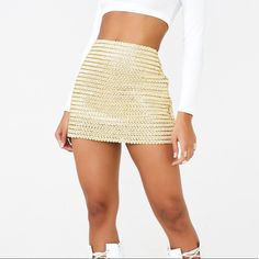 Gold Woven Skirt From Kiki Riki. It’s A Size Small But Runs Big. Would Fit A M/L. Glamorous Gold Mini Skirt, Gold Mini Skirt For Night Out, Gold Lined Skirt For Night Out, Chic Gold Lined Skirt Bottoms, Chic Gold Bottoms With Lined Skirt, Glamorous Stretch Mini Bottoms, Glamorous Stretch Mini Length Bottoms, Glamorous Mini Stretch Bottoms, Glamorous High Waist Skirt For Club