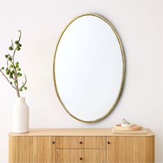 a round mirror sitting on top of a wooden dresser Full Length Mirror Gold, Bone Inlay Mirror, Mirror Handmade, Handmade Mirror, Handmade Mirrors, Brass Mirror, Oval Wall Mirror, Handmade Brass, Oval Mirror