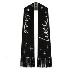 This blanket scarf is the ultimate winter warmer. Its oversized proportions are perfect for keeping cosy during the colder months. Featuring Little Lies branding and that iconic celestial twinkle, with contrast tipping and tassel detail.  Black / Ivory  Styled with our Hypnotised Satin Wide Leg Trousers Hand wash  100% Acrylic Stocking Fillers For Him, Knit Loungewear, Stocking Fillers For Her, Holiday Party Outfit, Winter Warmers, Blanket Scarf, Independent Designers Fashion, Knit Scarf, Wide Leg Trousers