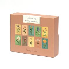 the memory game is designed to look like it's in a box with flowers