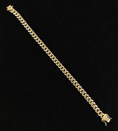 "6.7mm All Shiny Mens Miami Cuban Bracelet Box Clasp Lock Real 14K Yellow Gold * Metal : Real 14K Yellow Gold, (Properly Stamped, 14K) * Condition : Brand New * Finish : Polished * Weight : Apox 12 gram * Length : 8 inches * Width : 6.7mm * Clasp/Bail : Box Clasp Lock These Chains are 100% Authentic 10K Gold \"Not Plated or Filled\" This is a Beautiful Genuine Real 10K Solid Gold Miami Cuban Chain and Will look Great on Men & Women. Bosphorusgold" Classic Cuban Link Chain Bracelet, Formal Cuban Link Chain Bracelet, Yellow Gold Cuban Link Bracelet With Solid Construction, Classic Cuban Link Bracelet With Gold Chain, 14k Gold Cuban Link Chain Bracelet, Luxury Gold Chain Cuban Link Bracelet, 14k Yellow Gold Cuban Link Chain Bracelet, Luxury Yellow Gold Cuban Link Bracelet With Curb Chain, Classic Yellow Gold Cuban Link Tennis Bracelet