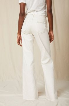 Make a statement in our best-selling high-rise, wide leg silhouette. With an easy fit though the hip and thigh, full inseam, slight distressing at the pockets and a raw frayed hem, they're your new everyday denim. Zip fly. WASH: WHITE OAK FIT & MEASUREMENTS: Inseam = 33" Front Rise = 13" Back Rise = 16" Leg Opening = 23" Measurements taken from size 27 Taliha is wearing a size 24 and is 5'10" Take your normal size for a full easy fit, or size down to be more fitted around the waist Fabric & Care Everyday Fall Pants With Frayed Hem, Mid-rise Flare Jeans With Frayed Hem, High Rise Relaxed Fit Jeans With Frayed Hem, Chic Wide Leg Jeans For Everyday, Straight Leg Bottoms With Frayed Hem For Fall, Wide Leg Bottoms With Frayed Hem For Everyday, Everyday Wide Leg Bottoms With Frayed Hem, Chic Relaxed Fit Jeans, Chic Cropped Jeans With Frayed Hem