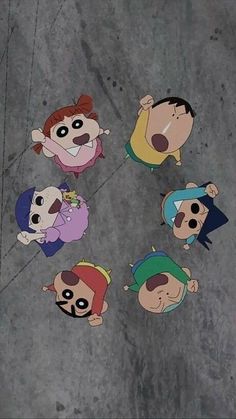 five cartoon characters are standing in a circle