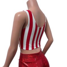 Made of our red stripe print spandex w/ red mesh inset in the front, this crop tank top fits snug to the body with plenty of stretch. Wear this to a rave, to the club, a rave, to a festival, or a night out. Also great for running, yoga, roller derby, or any activity.*We can make this top in any of our available fabrics - you can request the custom fabric choices in the personalization box if you prefer something other than what is shown in this listing. Red Summer Tank Top For Club, Red Sleeveless Tank Top For Club, Red Tank Top For Summer Clubbing, Red Sleeveless Stretch Crop Top, Stretch Red Cropped Tank Top, Red Stretch Cropped Tank Top, Red Cropped Stretch Tank Top, Fitted Crop Top For Gym In Summer, Sporty Fitted Crop Top For Cheerleading